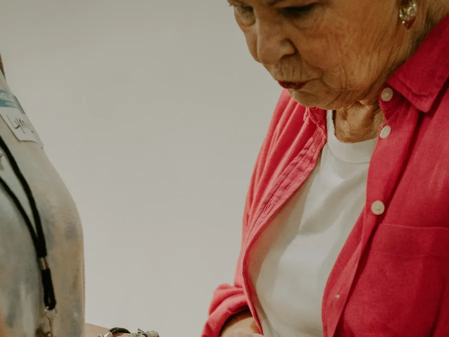 Two women praying together